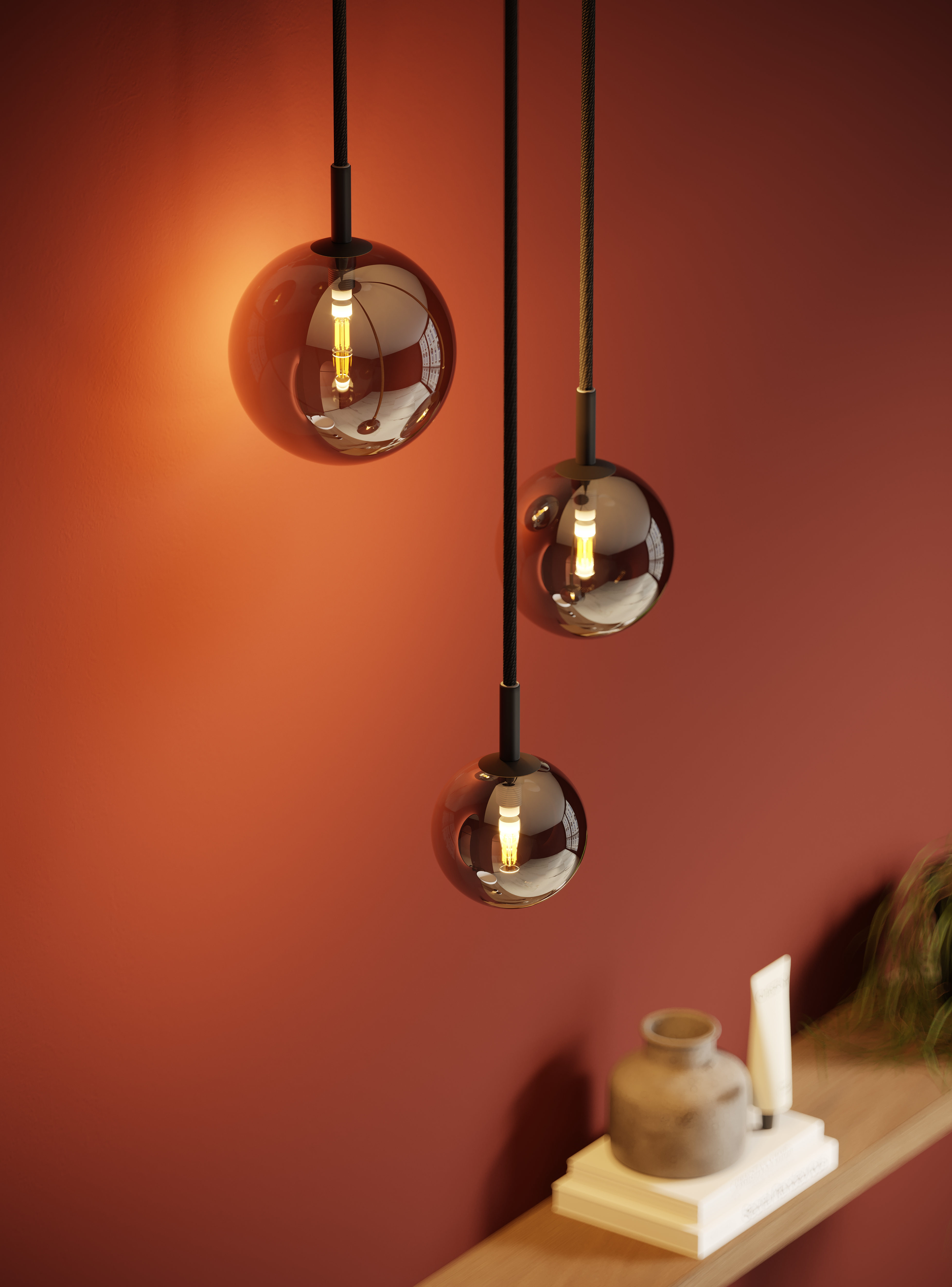 Hanglampen voor een terracotta wand